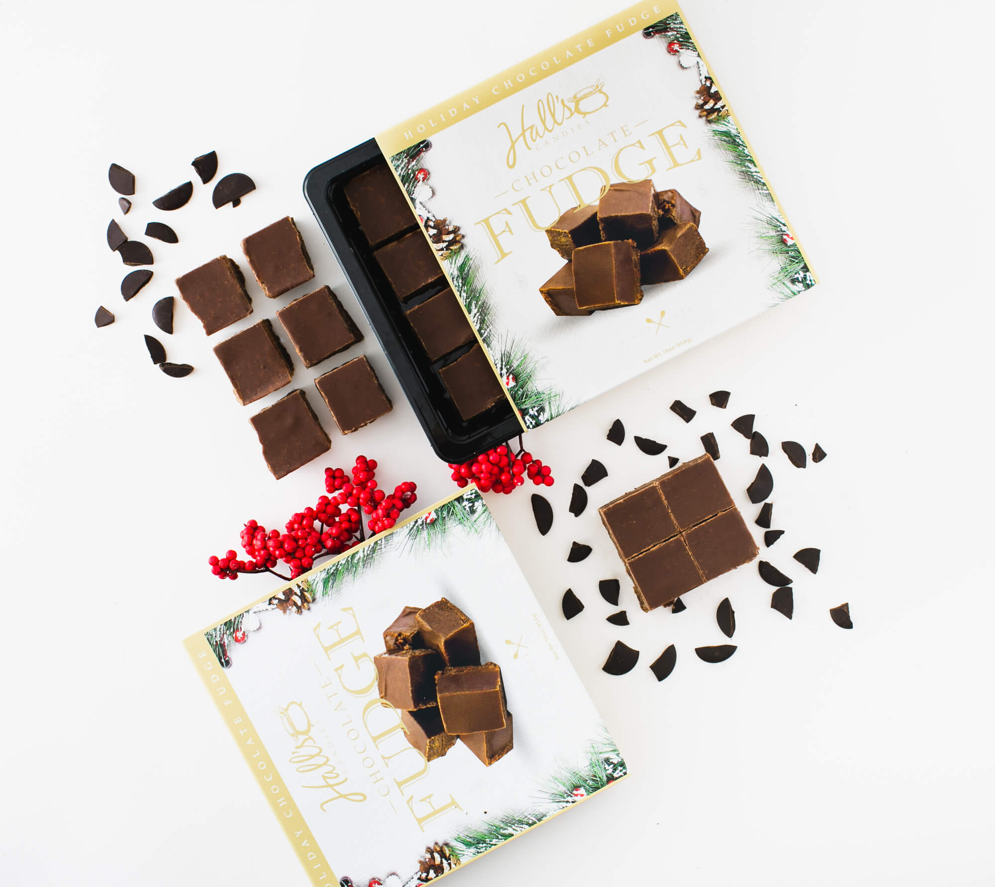 festive arrangement of holiday chocolate fudge on white background