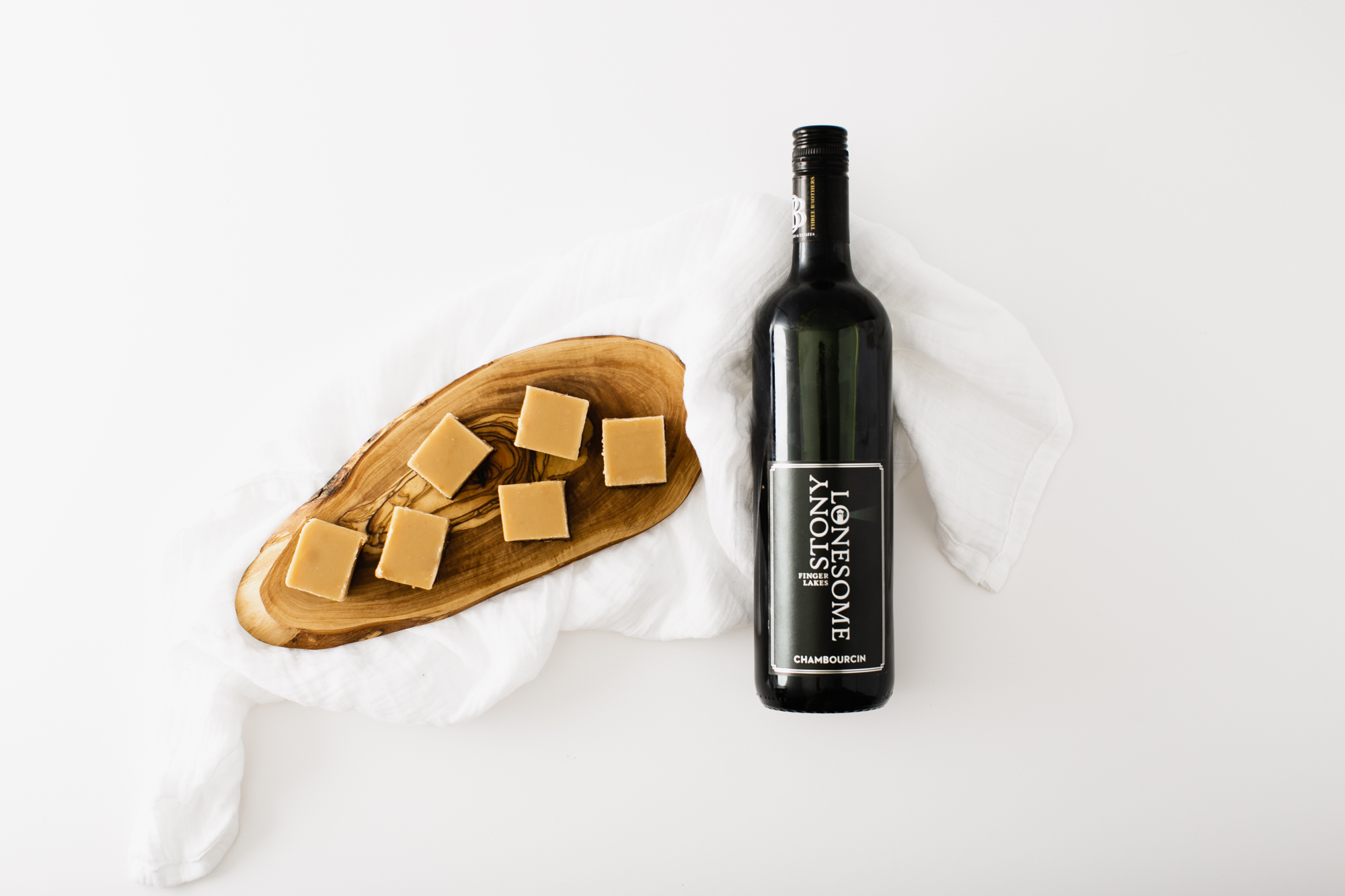 chambourcin wine and peanut butter fudge with white towel